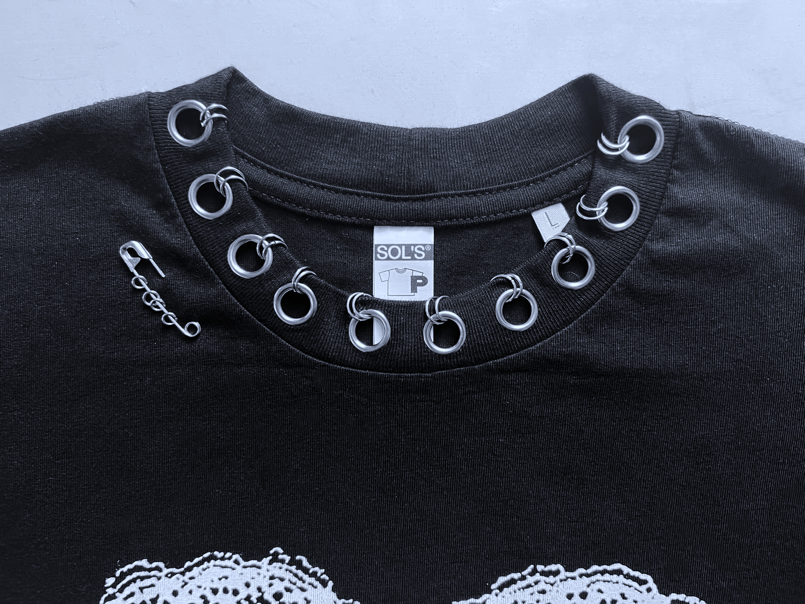 1/1 PIERCED CEMETERY TEE - L